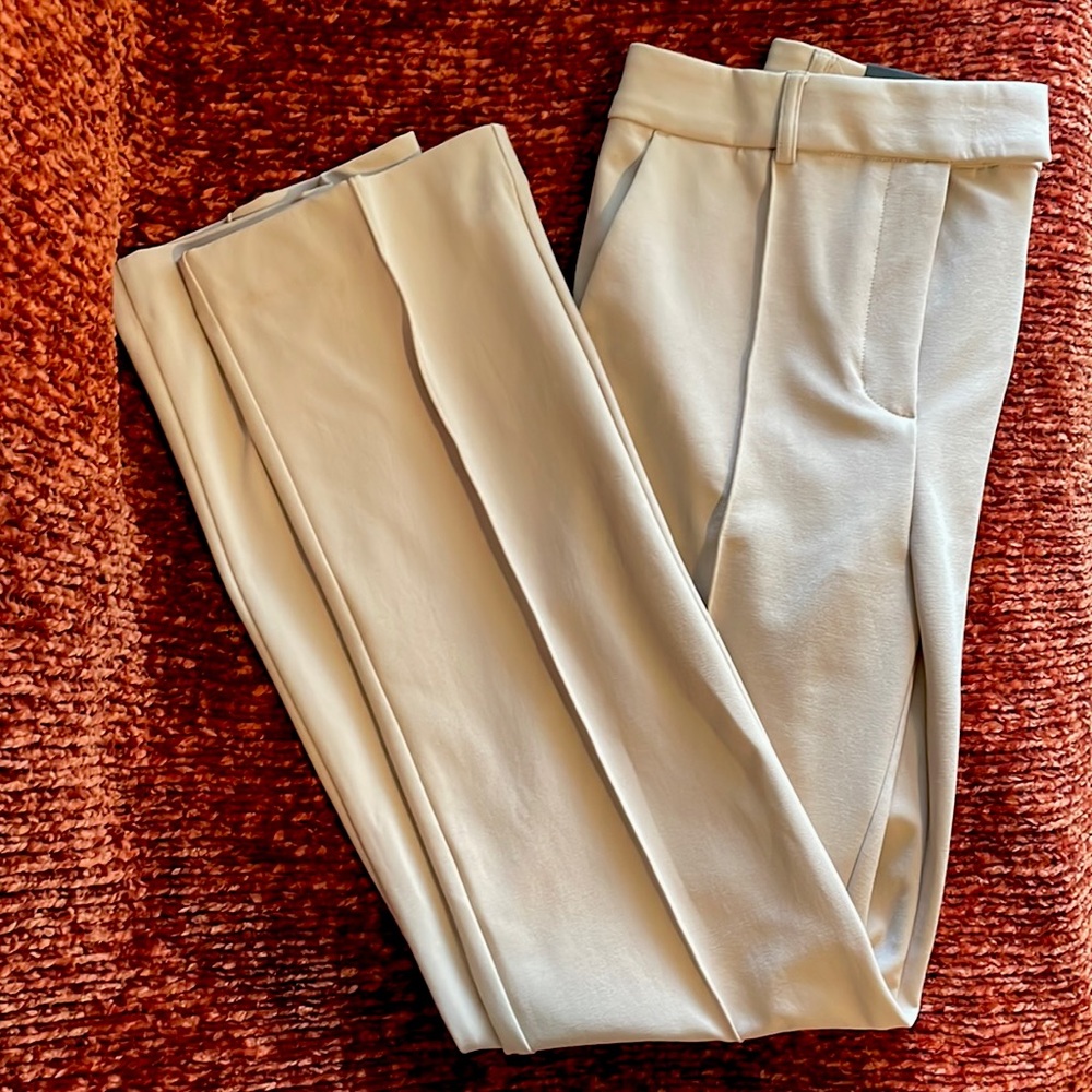 Express boot high rise pleated pants. Tan in color, size small.